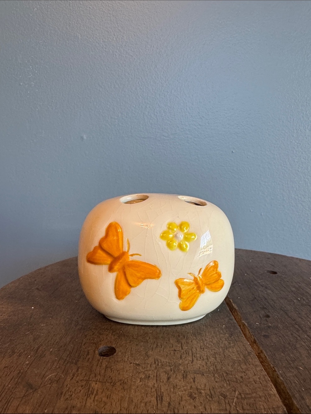 Ceramic Butterfly Toothbrush Holder in Cream with Orange Accents